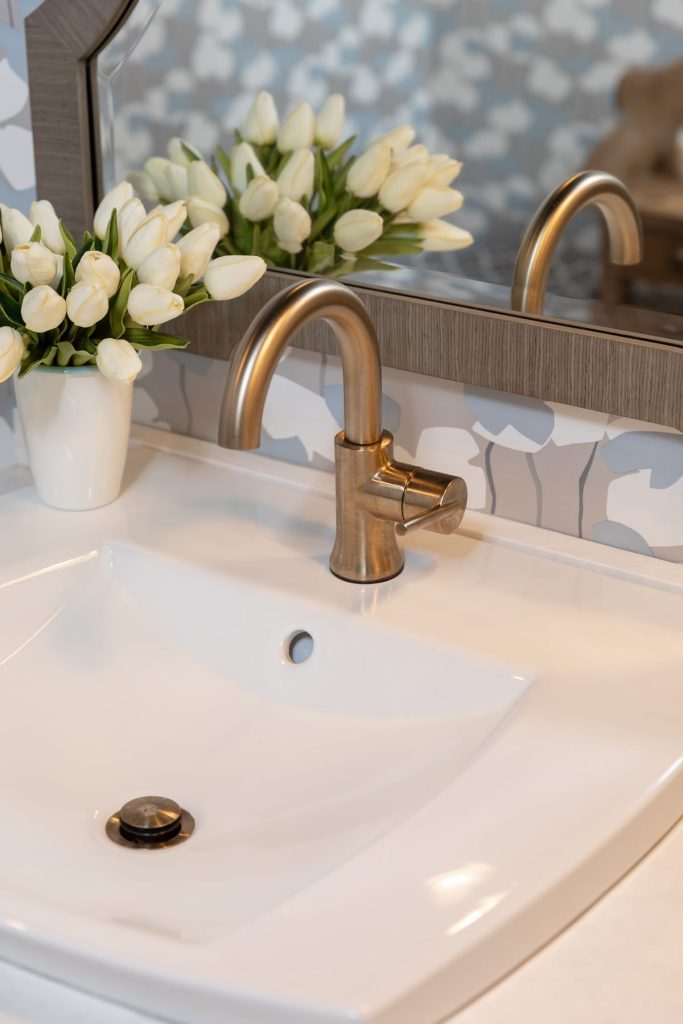 White sink with gold hardware - Blue and White Bathroom