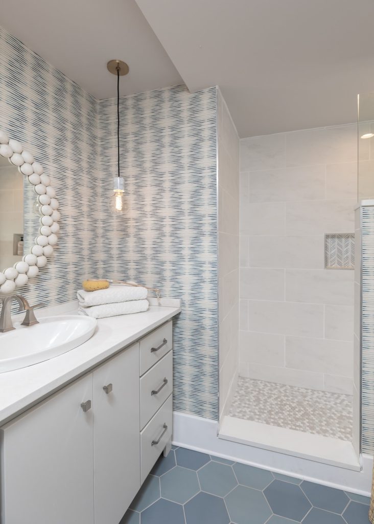 White and Blue Scandinavian Master Bathroom remodel with blue wallpaper