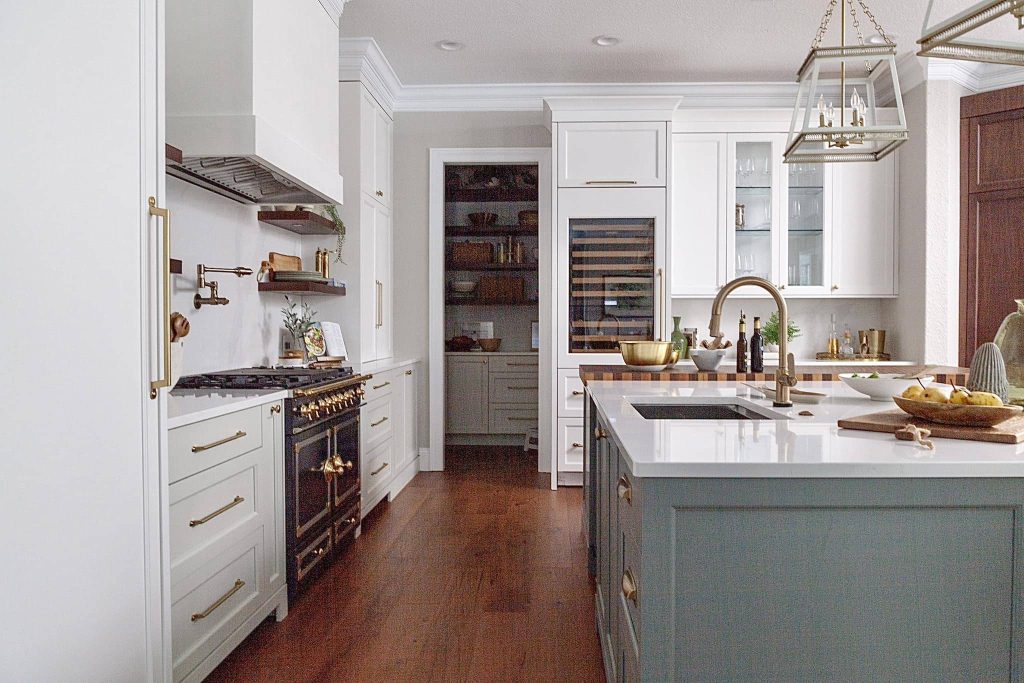 dark blue colored range with faux plaster hood